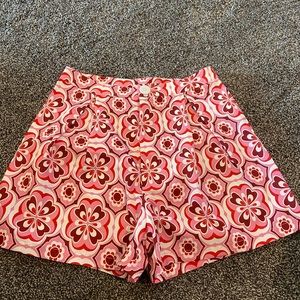 Brand NEW colorful shorts w/o tags. Size 4, runs big.